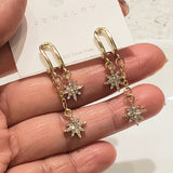 Gold Star Dangle Earrings | Style No. 233